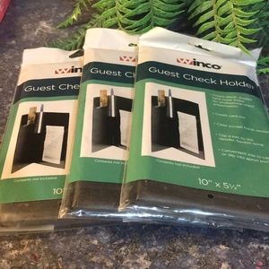 3 guest check holders never been used.